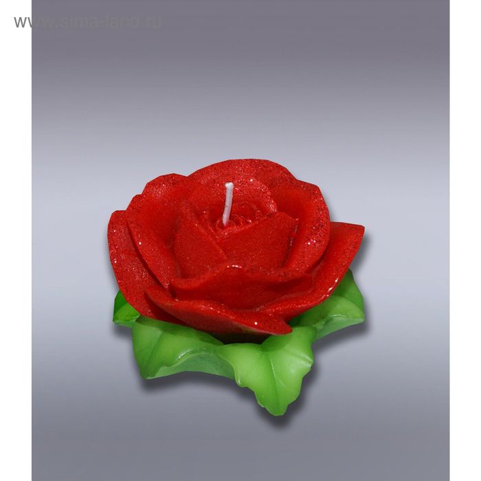 Свеча роза красная на листьях - Фото 1