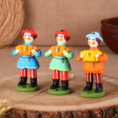 Дымковская игрушка «Фигурка: Мужик стоячий с гармошкой»