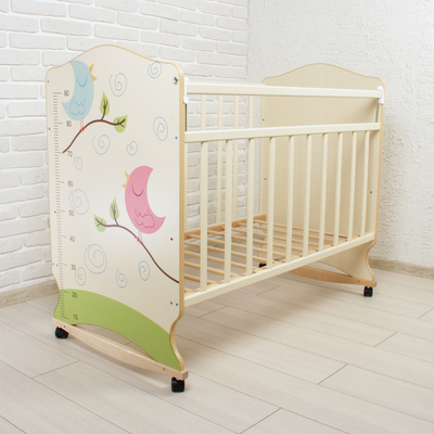 Детская кроватка «Морозко. Птички» с ростомером, на колёсах или качалке, цвет бежевый/слоновая кость