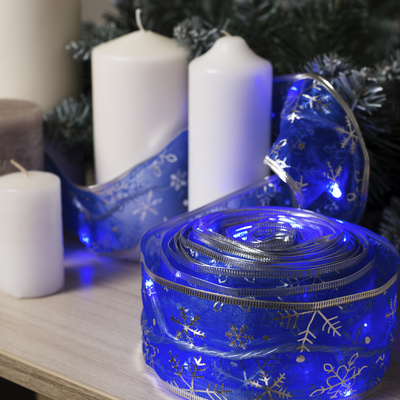 Гирлянда "Нить" 9 м с лентой" Снежинки серебристые", IP20, прозрачная нить, 72 LED, свечение синее, 8 режимов, 220 В