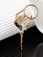 Брошь "Гимнастка" с хулахупом, цвет чёрно-белый в золоте - фото 809295216