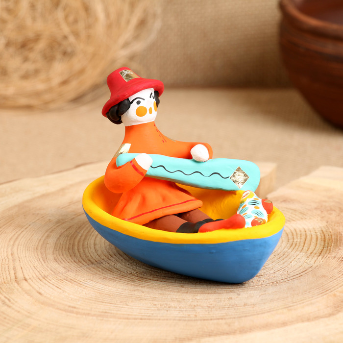 Дымковская игрушка "Мужик в лодке"