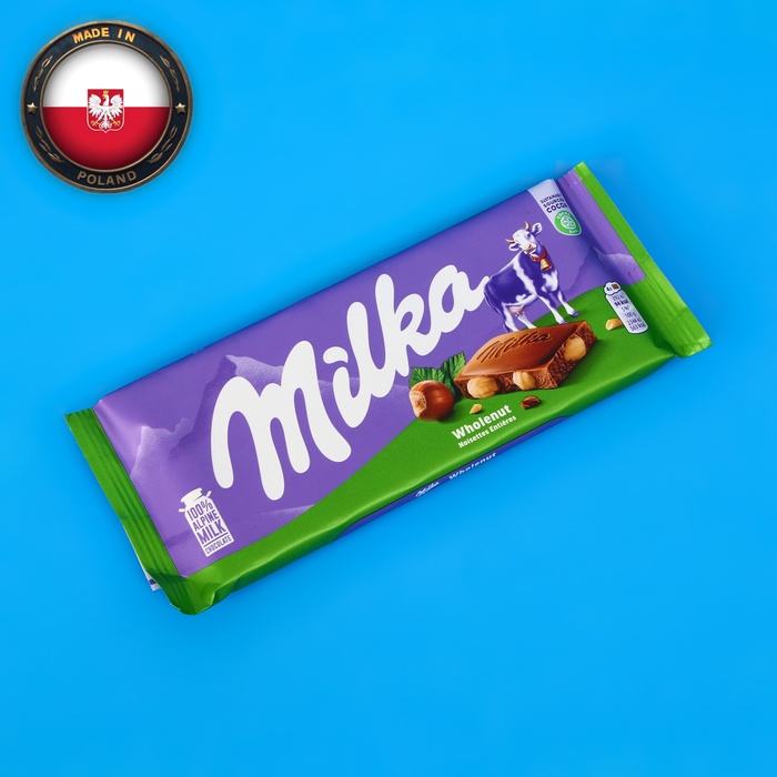 Шоколадная плитка Milka, с цельным фундуком, 100 г - Фото 1