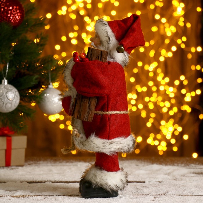 Дед Мороз  "В красной шубке, с брёвнышком" 29 см - фото 1908394291