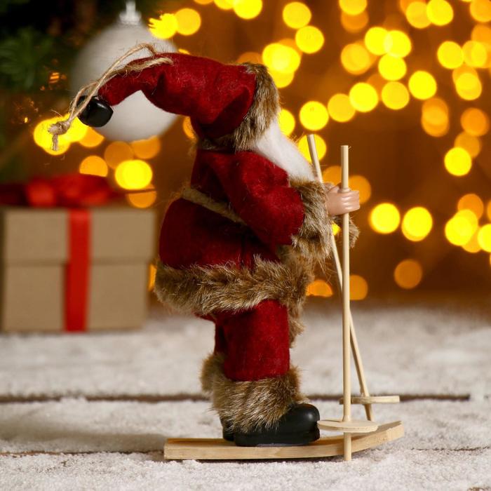 Дед Мороз "На лыжах" в бордовом костюме, 17 см - фото 1908396781