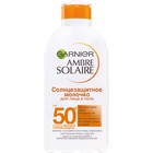 Солнцезащитное молочко для лица и тела Garnier Ambre Solaire, Spf 50+, водостойкое, нежирное, с карите, 200 мл - Фото 1