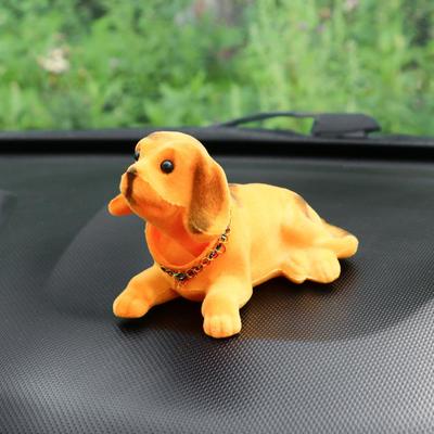 Игрушка на панель автомобиля «Собака качающая головой» рыжая
