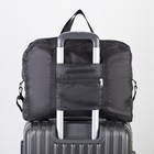 Сумка дорожная, складная в косметичку, отдел на молнии, наружный карман, длинный ремень, цвет чёрный - фото 25403613