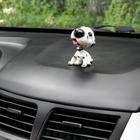 Собака на панель авто, качающая головой, далматин - Фото 2