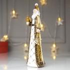 Сувенир полистоун "Дед Мороз в золотой шубе, с птичкой и звездой" 22х6,5х7 см - фото 24724468