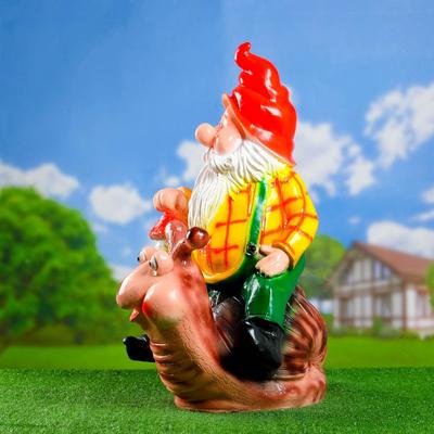 Садовая фигура из гипса «Гном на улитке», 71×34×41 см