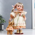 Кукла коллекционная керамика "Иришка в бежево-оранжевом платье с цветами и мишкой" 30 см - фото 9437807