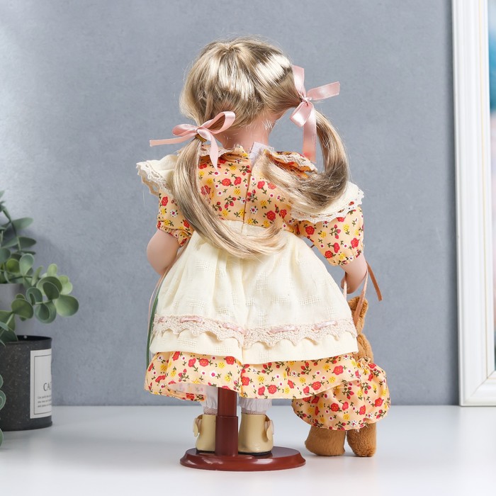 Кукла коллекционная керамика "Иришка в бежево-оранжевом платье с цветами и мишкой" 30 см 51489