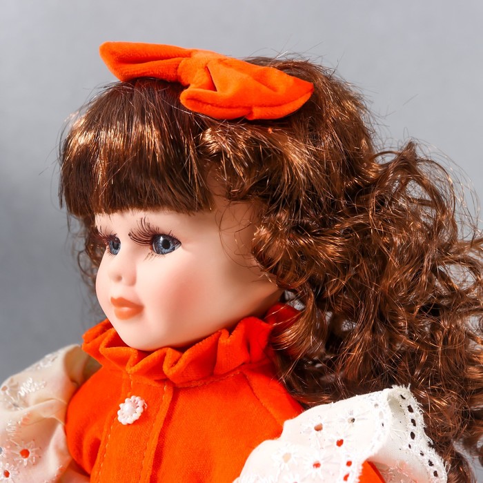 Кукла коллекционная керамика "Агата в ярко-оранжевом платье и банте, с рюшами" 30 см - фото 1901617078