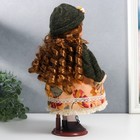 Кукла коллекционная керамика "Алёна в платье с цветами, в зелёной шапке и джемпере" 30 см - фото 3875250