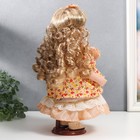 Кукла коллекционная керамика "Тося в кремовом платье с цветочками, с бантом в волосах" 30 см   75861 - фото 6620221