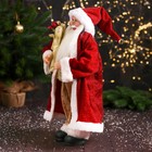 Дед Мороз "В колпачке, подарком и ягодами" 46 см, красный - фото 3878121