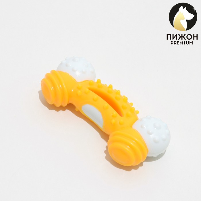 Игрушка двухслойная (твердый и мягкий пластик) "Изогнутая кость", 13 см желтая - Фото 1