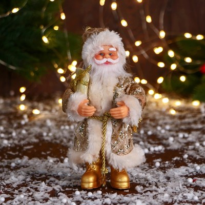 Дед Мороз "В колпаке, с подарком " 17 см, золото