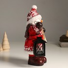 Подсвечник на 1 свечу «Снеговик в красной шубке, с фонарём и лыжами», керамика, 21.5×12×31 см - Фото 2