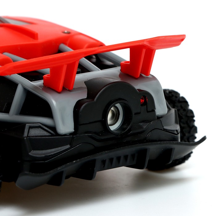 Машина радиоуправляемая «Гоночная», работает от батареек, открываются двери, световые эффекты, цвет красный 65862