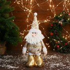 Мягкая игрушка "Дед Мороз в костюме с ромбиками" стоит, 15х30 см, золото - фото 320560941