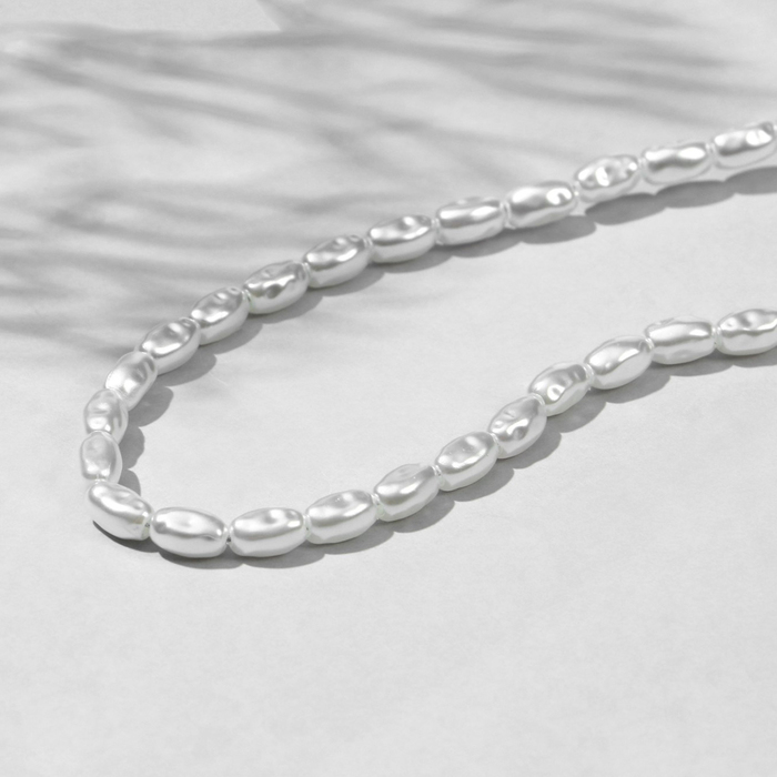 Бусины пластиковые на нити «Жемчуг» рис 0.7×0.5×0.5 см, (набор 150 шт.), белые