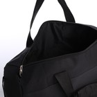 Сумка дорожная на молнии, 3 наружных кармана, держатель для чемодана, длинный ремень, цвет чёрный - фото 11130349