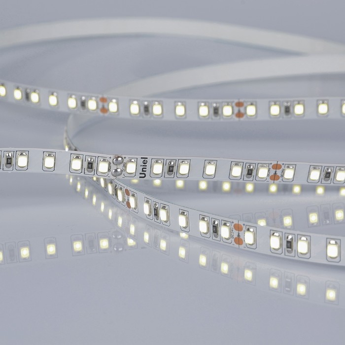 Светодиодная лента на самоклеящейся основе Uniel, IP20, 5 м, 120 LED/м, 9,6 Вт/м, 24 В, 6500К, свечение дневное белое - Фото 1