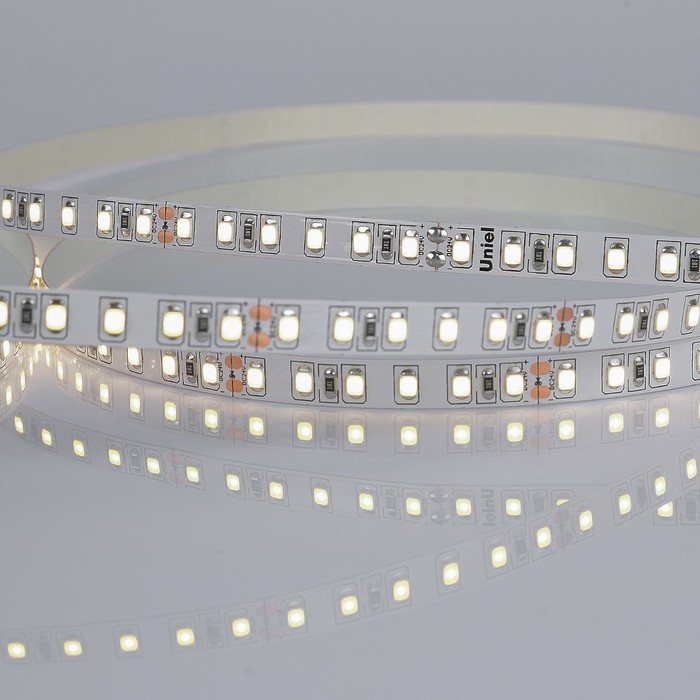 Светодиодная лента на самоклеящейся основе Uniel, IP20, 5 м, 120 LED/м, 9,6 Вт/м, 24 В, 4000К, свечение белое - Фото 1