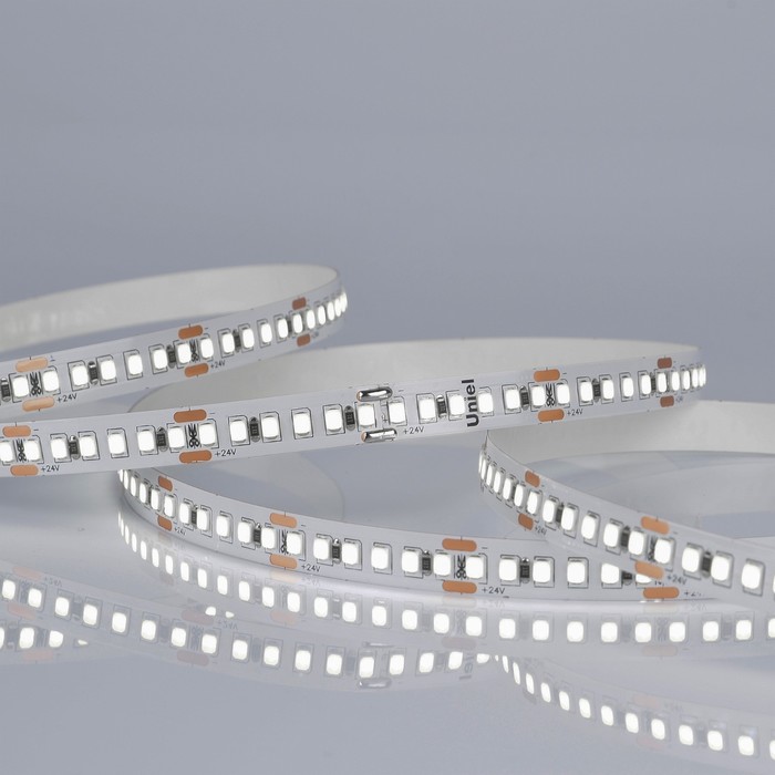 Светодиодная лента на самоклеящейся основе Uniel, IP20, 5 м, 180 LED/м, 17 Вт/м, 24 В, 6500К, свечение дневное белое - Фото 1
