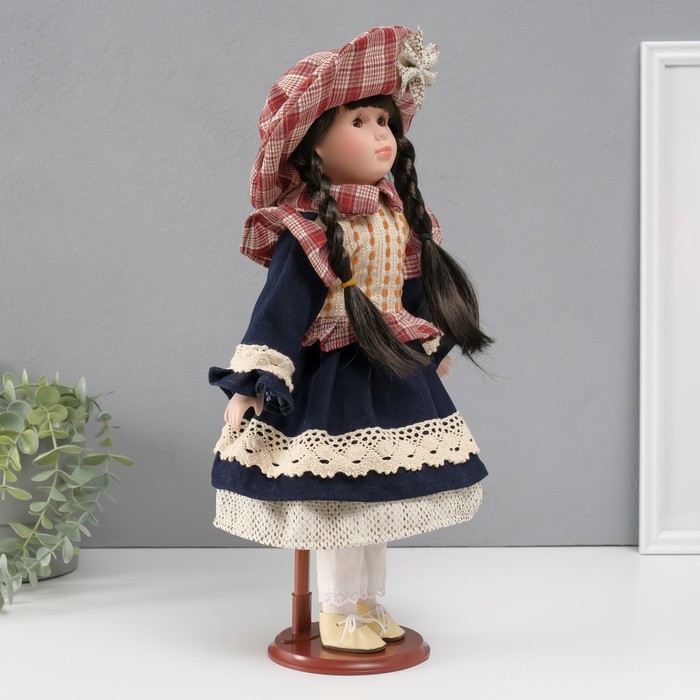 Кукла коллекционная керамика "Есения в бежевой жилетке и синей юбке" 39 см - фото 1911137339