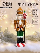 Фигурка полистоун «Щелкунчик в имбирном мундире, с кексом и пикой с леденцом», 13×10×35.5 см - Фото 1