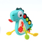 Развивающая сенсорная игрушка - погремушка Крошка Я «Малыш Дино» - Фото 3