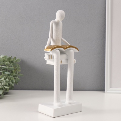 Фигурка полистоун «Абстракция. Человек сидит на книгах читает», белый с серебром, 7.5×11×30 см
