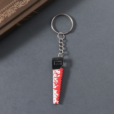 Брелок акрил зеркальный "Окровавленная пила" 5,1х1,3х0,3 см