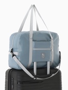 Сумка дорожная на молнии, 3 наружных кармана, держатель для чемодана, длинный ремень, голубая - Фото 6