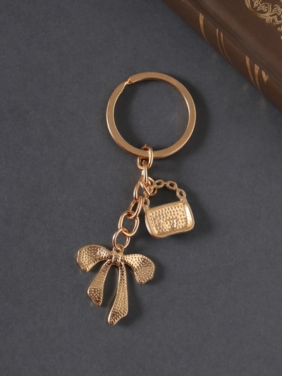 Брелок металл, эмаль "Сумочка и бант" белый 9 см