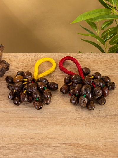 Сувенирный музыкальный инструмент «Погремушка», 16×10×3 см, орех кемири, МИКС