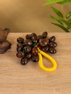 Сувенирный музыкальный инструмент «Погремушка», 16×10×3 см, орех кемири, МИКС 10650451 Сувенирный музыкальный инструмент «Погремушка», 16×10×3 см, орех кемири, МИКС 10650451