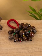 Сувенирный музыкальный инструмент «Погремушка», 16×10×3 см, орех кемири, МИКС 10650451 Сувенирный музыкальный инструмент «Погремушка», 16×10×3 см, орех кемири, МИКС 10650451