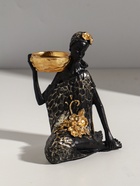 Подсвечник полистоун "Африканка в чёрном платье с цветами" с золотом d=4,5 см 11х13х16 см - фото 63232867