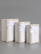 Набор подарочных коробок 3 в 1 прямоугольные с бантом, молочный, 23×16×9.5; 21×14×8; 19×12×6.5 см  (артикул 10958776)  большой выбор товаров оптом и в розницу по низким ценам с доставкой