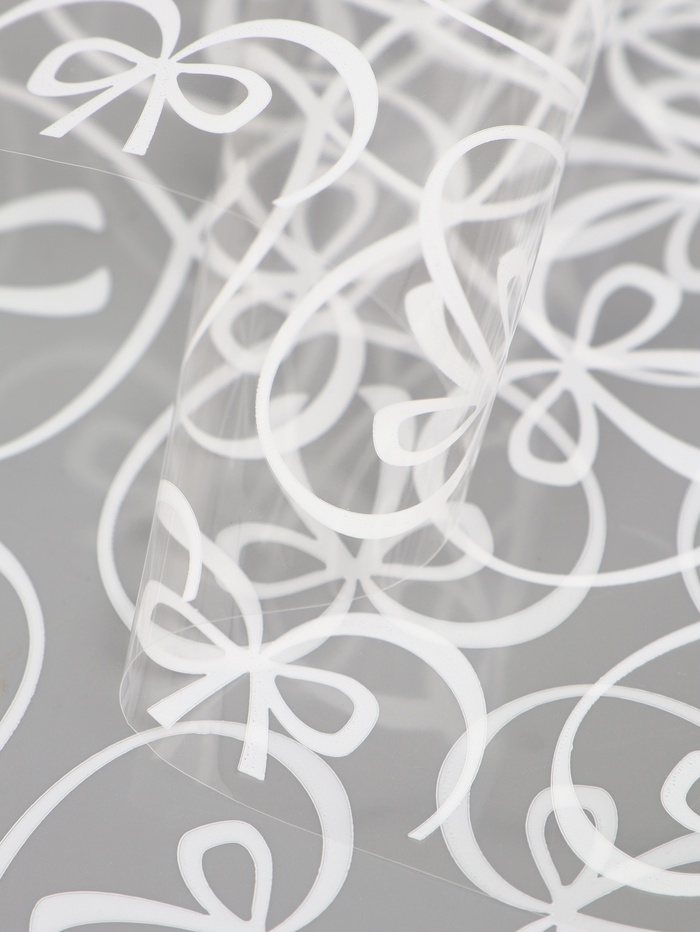 Плёнка для цветов «Бантики», прозрачная/белая, 0.6×9.3±5% м, 40 мкм, 200 г