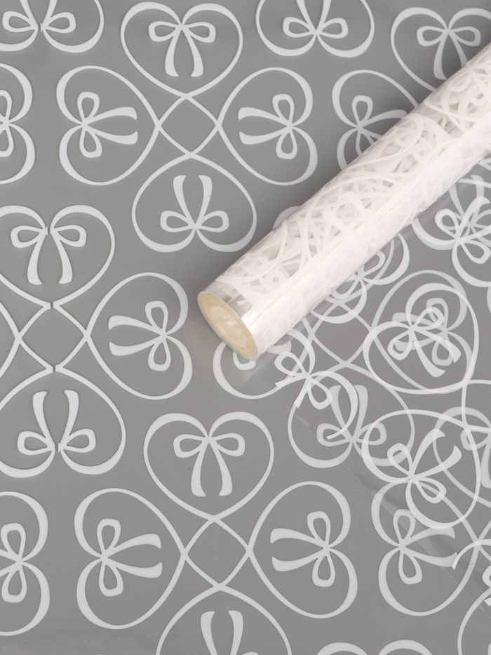 Плёнка для цветов «Бантики», прозрачная/белая, 0.6×9.3±5% м, 40 мкм, 200 г - Фото 1