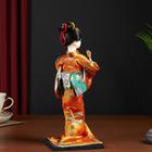 Кукла коллекционная "Гейша в оранжевом кимоно с веером" 22,5 см - фото 3790015